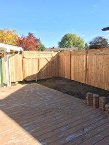 Wood Fence by Deluxe Fencing and Decks