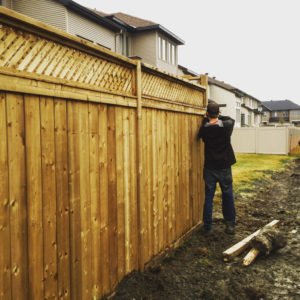 Wood Fence by Deluxe Fencing and Decks