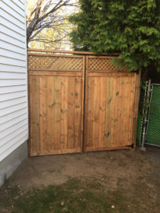 Wood Fence by Deluxe Fencing and Decks