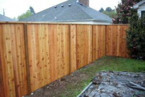 Wood Fence by Deluxe Fencing and Decks